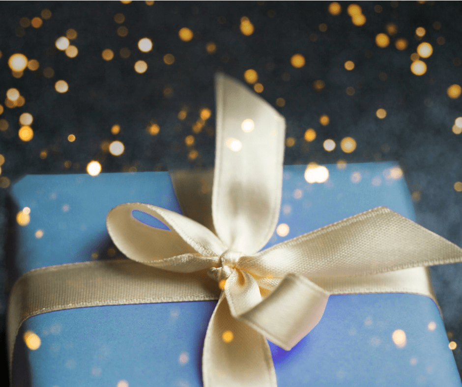 The perfect gift is a Vedas Gift Card at Vedas Medical Spa & Wellness Center. Image of a gift package.