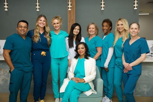 Staff Pic Seating Dr. Nangrani and staff at Vedas Medical Spa & Wellness Center