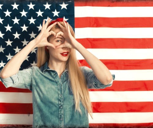 Image of a woman in front of the American flag, 4th July special offers at Vedas Medical Spa & Wellness Center