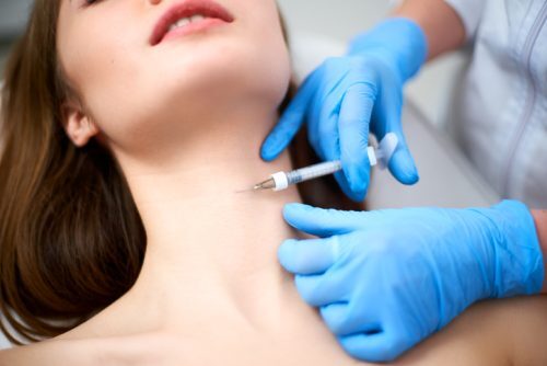 The image is showing Botox in the neck area which results in a smoother appearance- Vedas Medical Spa & Wellness Center