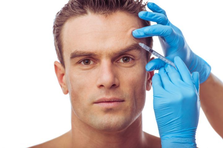Handsome man having botox- Vedas Medical Spa & Wellness Center